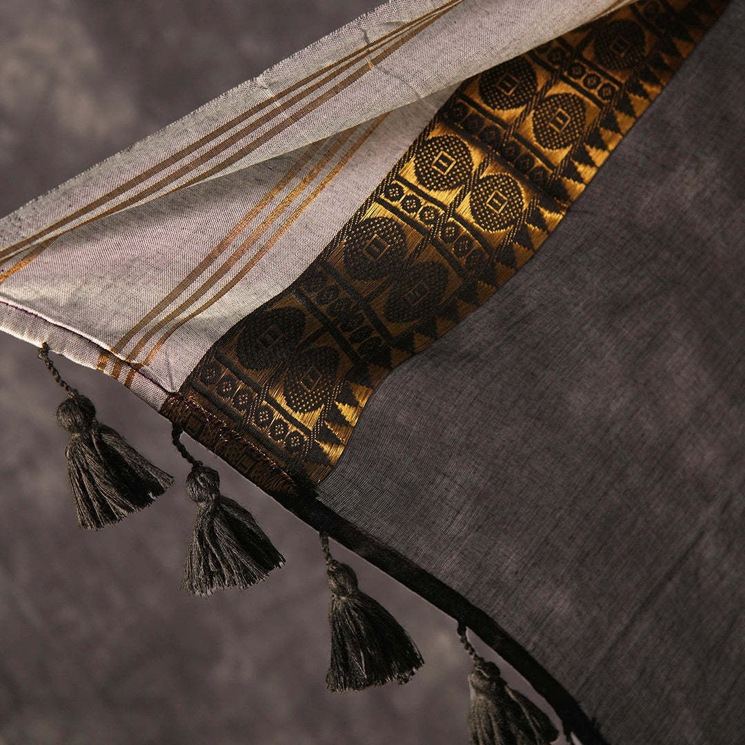 Regal Black Cotton Saree with Golden Border & Tassels