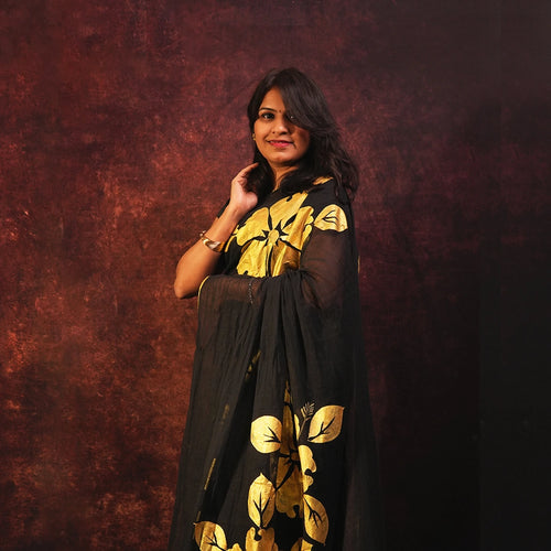 Black golden floral saree – designer hand-painted botanical statement saree – Kottanz Loom Co