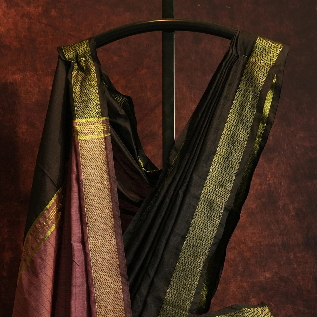 Close-up of Black Mul Cotton Jacquard Saree showing subtle textured jacquard pattern