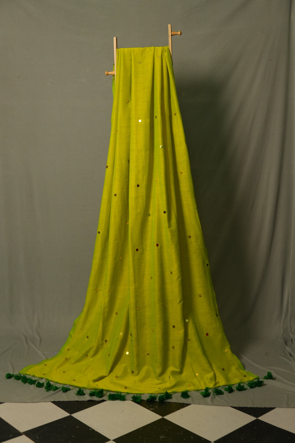 Side drape view of light green gini khadi sequin saree – handwoven cocktail saree for wedding guests and festive occasions by Kottanz Loom Co